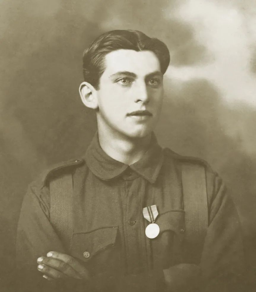 Portrait photograph of a young man in uniform, from the frontispiece of the book, under the heading “Walter Joseph Host”.
